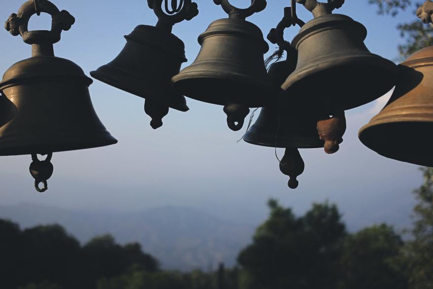 photography-of-black-hanging-bells-during-daytime-157554