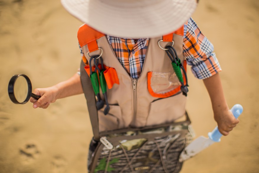 boy-wearing-brown-and-orange-jacket-3038308